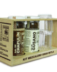 A packaged gift set containing two jars of salt labeled 'Gusano' and 'Chapulin', and two clear Mezcal glass shots, all displayed in a rectangular cardboard box.